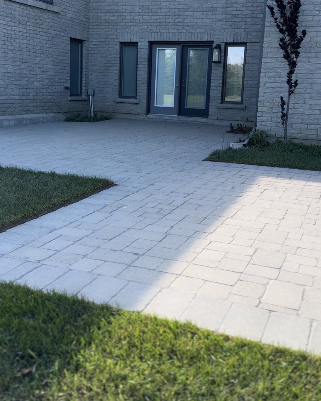 The same patio after restoration, clean with tight joints
